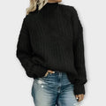 Women's cable knit mock neck sweater with drop shoulders and ribbed cuffs