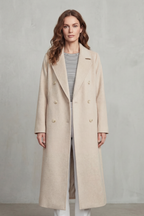 Woman wearing a long black double-breasted coat with notch lapels and six buttons - view 8