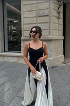 Black and ivory paneled maxi dress with spaghetti straps and flared godet skirt - view 10