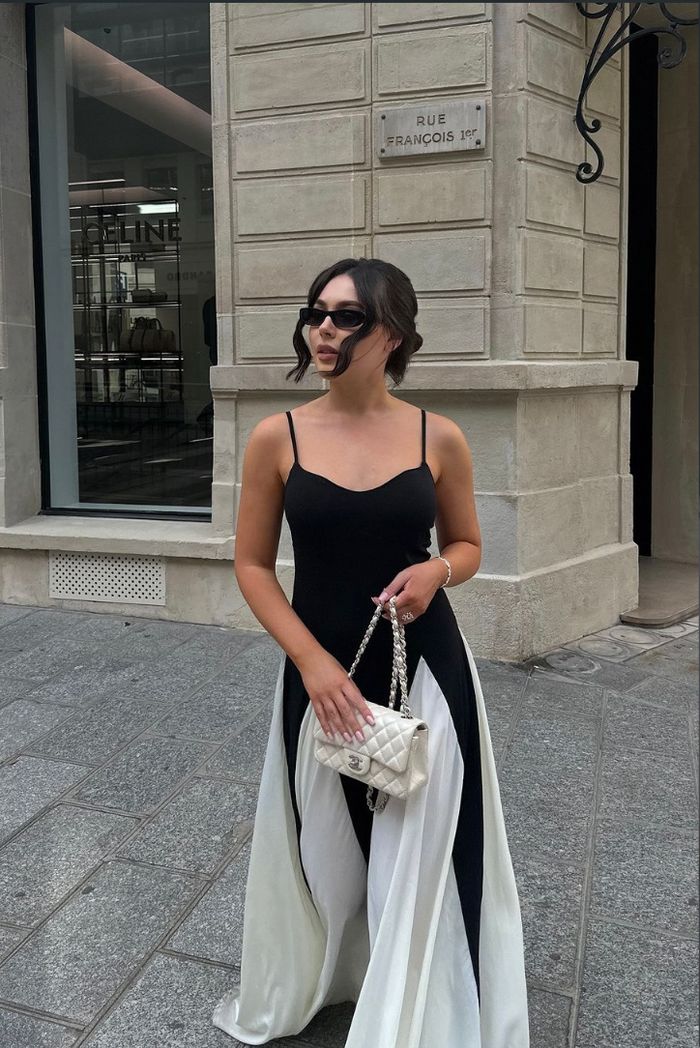 Black and ivory paneled maxi dress with spaghetti straps and flared godet skirt - view 10