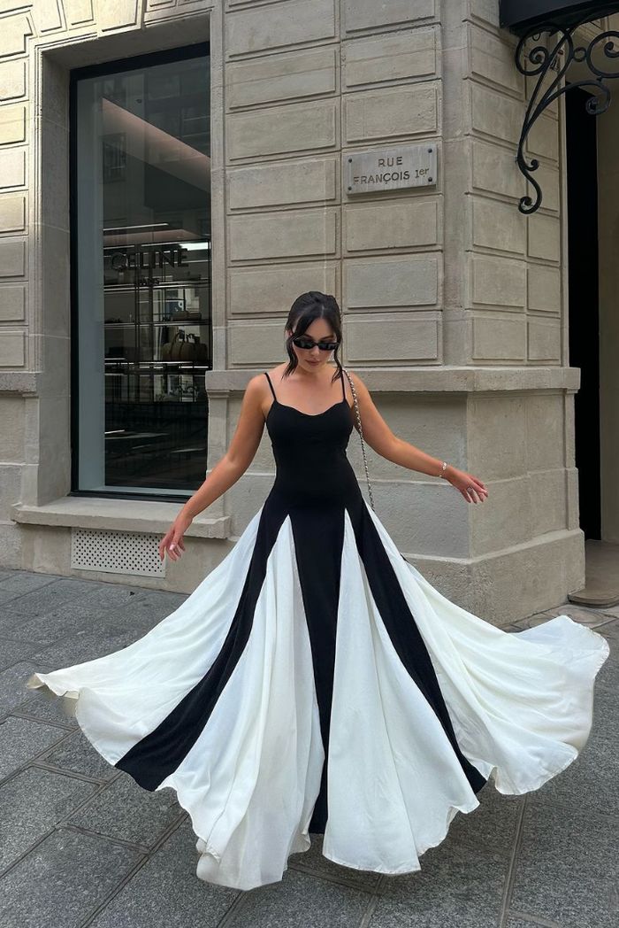 Black and ivory paneled maxi dress with spaghetti straps and flared godet skirt - view 11