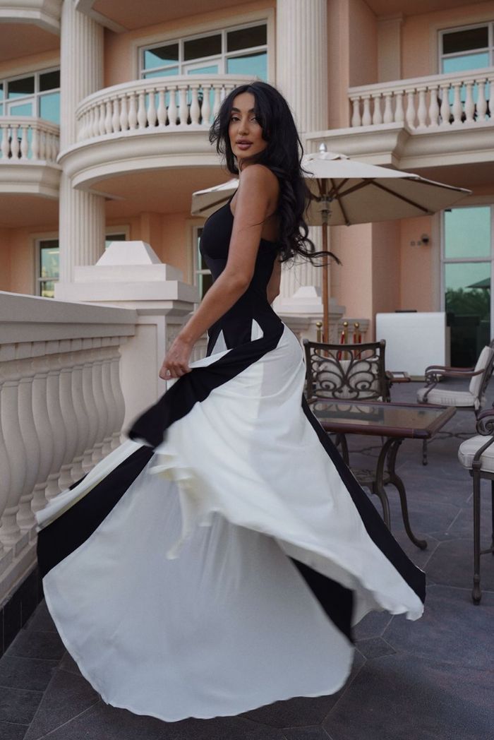 Black and ivory paneled maxi dress with spaghetti straps and flared godet skirt - view 7