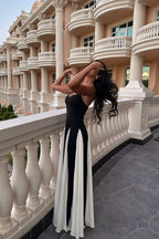 Black and ivory paneled maxi dress with spaghetti straps and flared godet skirt - view 8