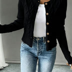 Cropped cable knit button up cardigan with gold-tone buttons and crew neck