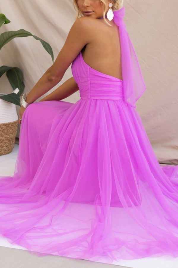 Woman wearing a sleeveless tulle halter midi dress with ruched bodice and full skirt - view 6