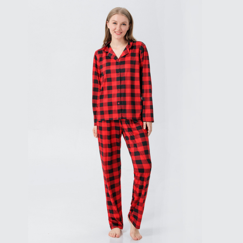 Family wearing matching red and black buffalo plaid Christmas pajamas - view 5