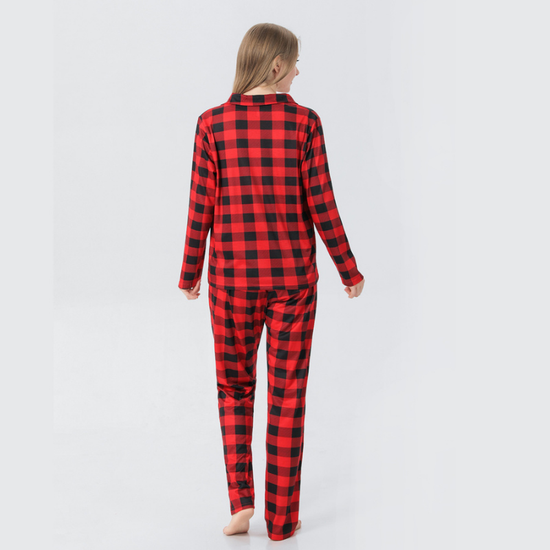Family wearing matching red and black buffalo plaid Christmas pajamas - view 6