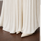 Double-breasted white cropped blazer with gold-tone buttons and matching pleated skirt - view 9