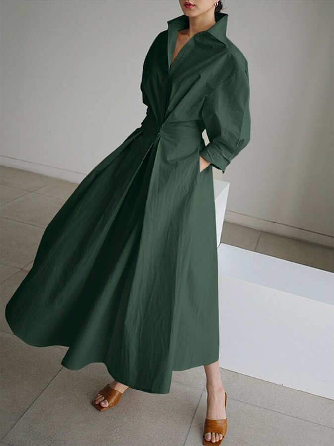 Woman wearing a long sleeve maxi shirt dress with collar, button waist and pleated A-line skirt - view 8