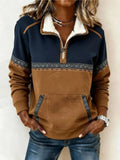 Womens quarter zip sweater with plush fold-down collar, navy and brown color-block panels and geometric trim
