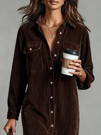 Woman wearing a long sleeve corduroy midi shirt dress with chest flap pockets and tall boots - view 6