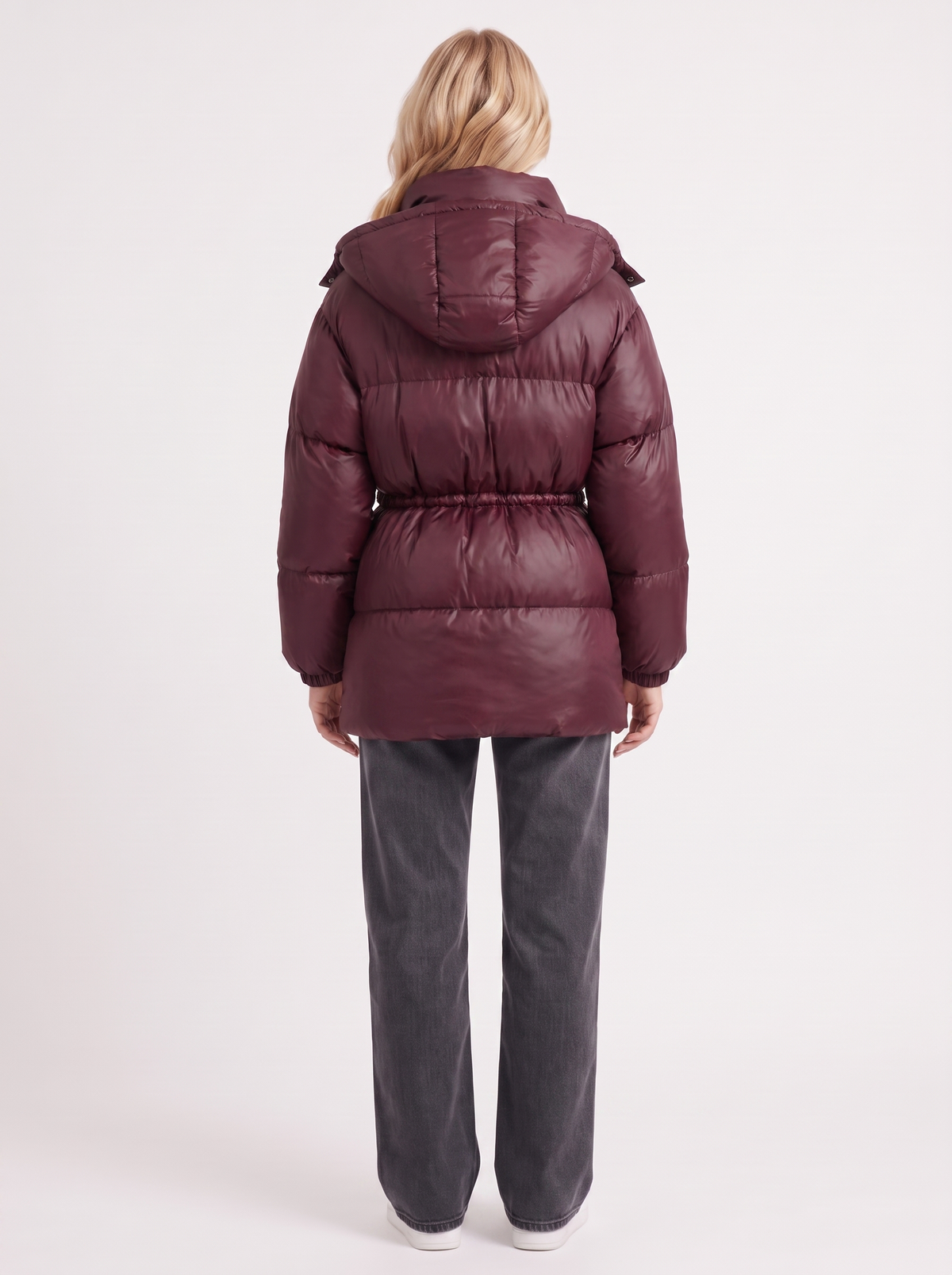 Woman in a brown quilted hooded puffer jacket with drawstring waist - view 11