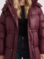Woman in a brown quilted hooded puffer jacket with drawstring waist - view 12