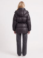 Woman in a brown quilted hooded puffer jacket with drawstring waist - view 23