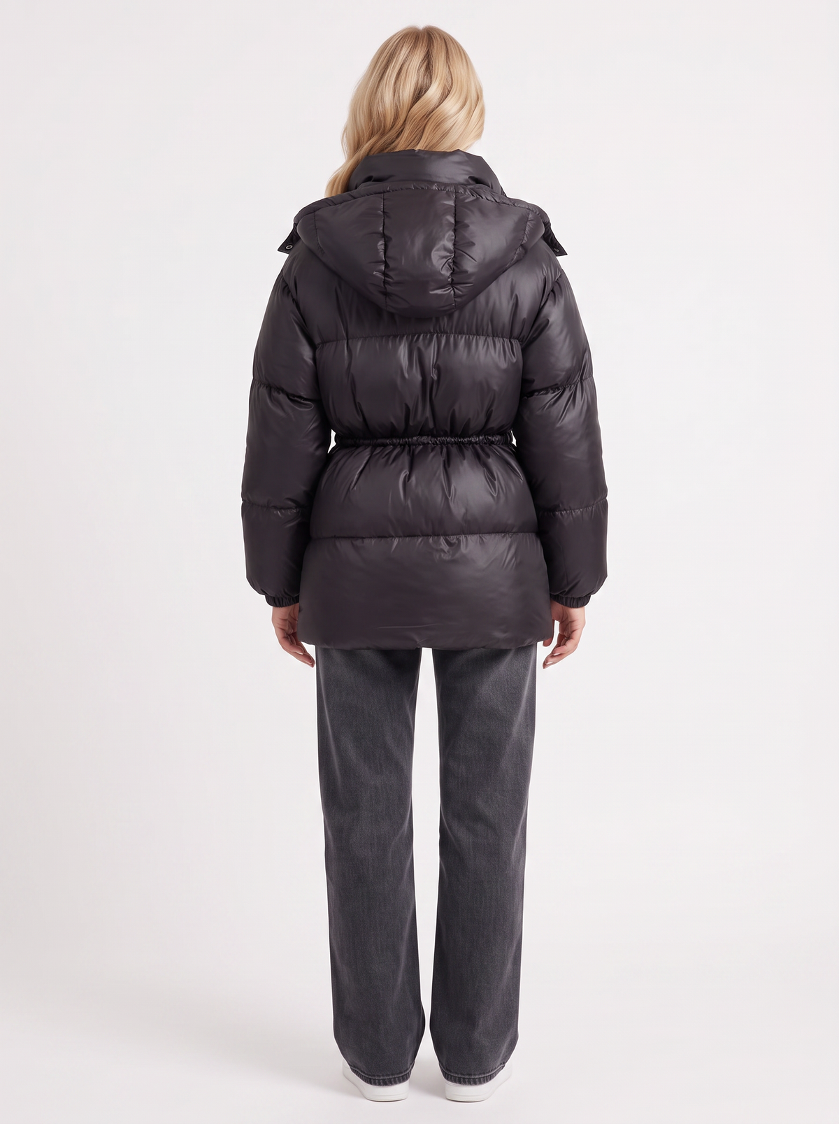 Woman in a brown quilted hooded puffer jacket with drawstring waist - view 23