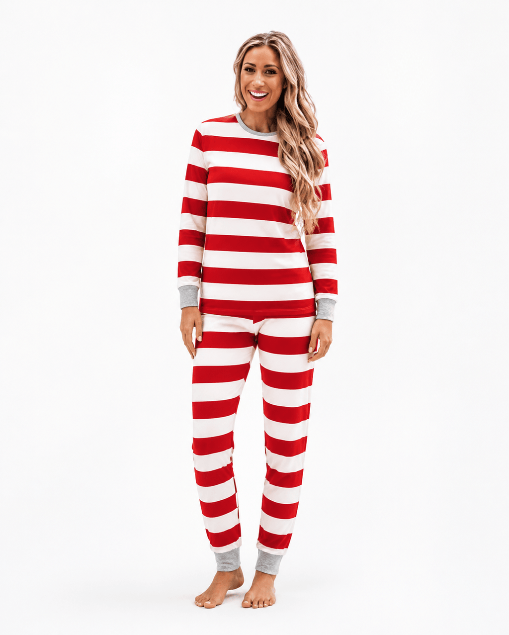 Family in matching red and white striped Christmas pajamas with gray cuffs - view 10
