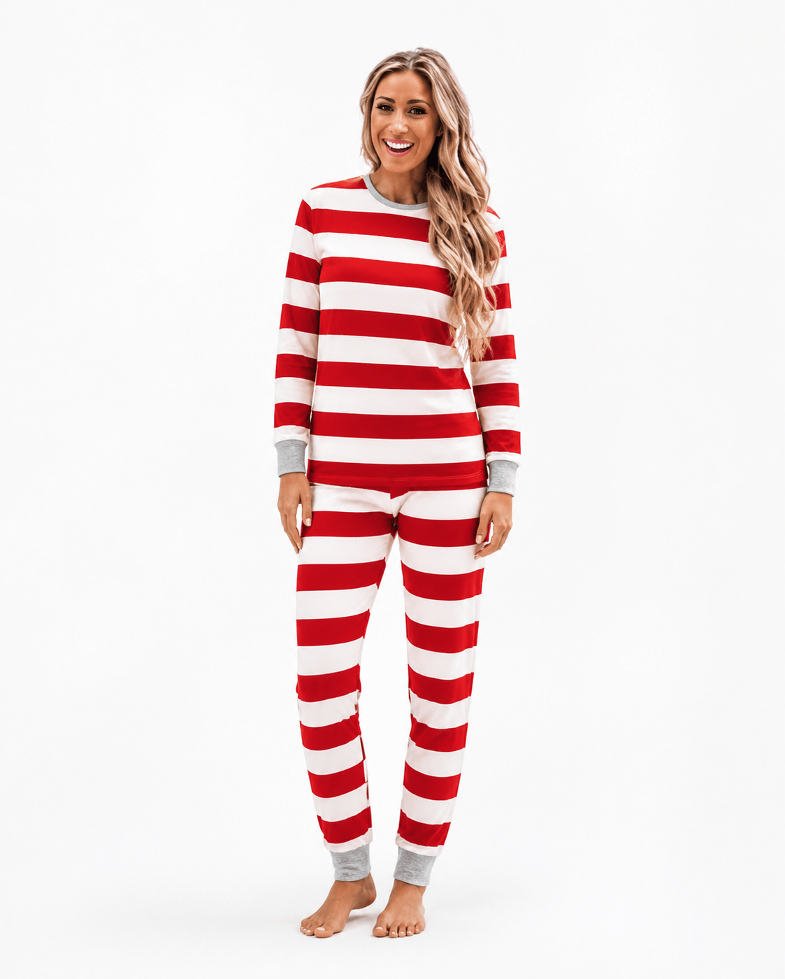 Family in matching red and white striped Christmas pajamas with gray cuffs - view 10