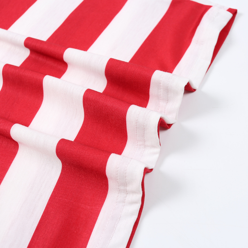 Family in matching red and white striped Christmas pajamas with gray cuffs - view 15