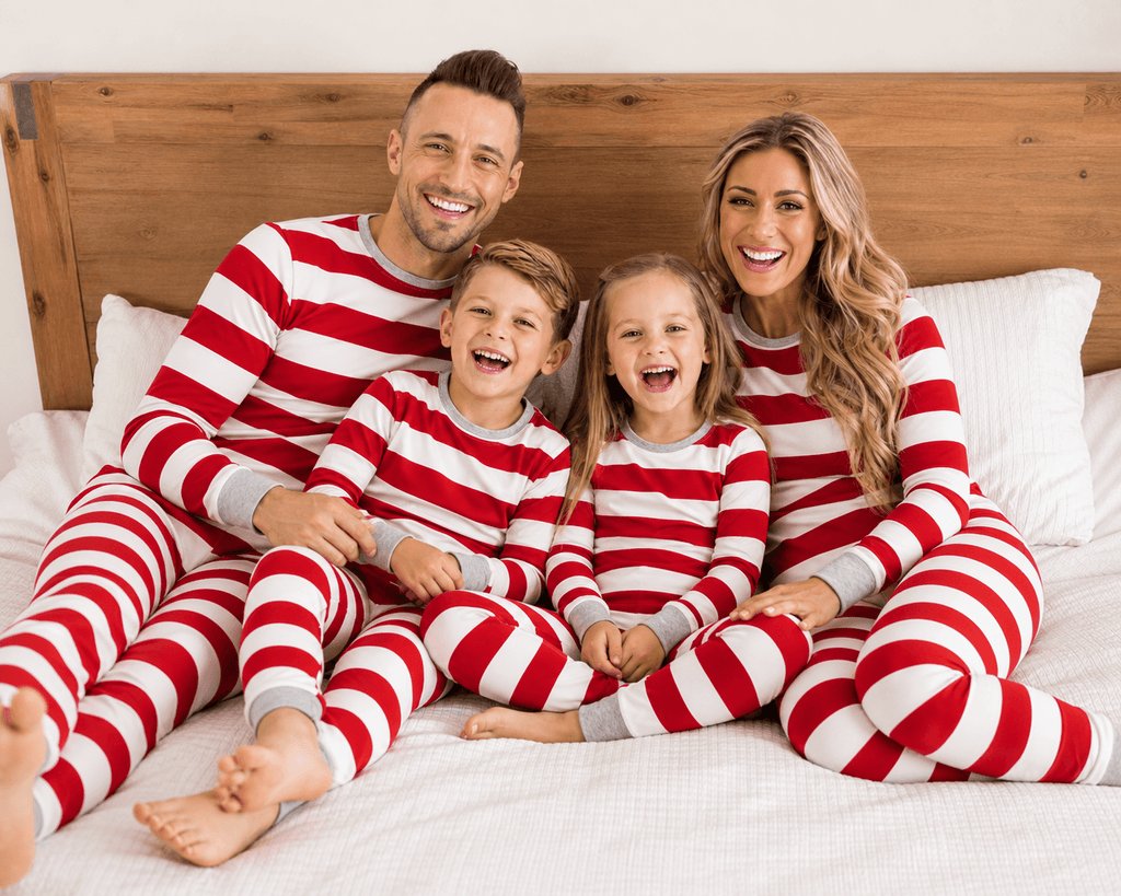 Family in matching red and white striped Christmas pajamas with gray cuffs - view 4