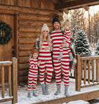 Family in matching red and white striped Christmas pajamas with gray cuffs - view 5