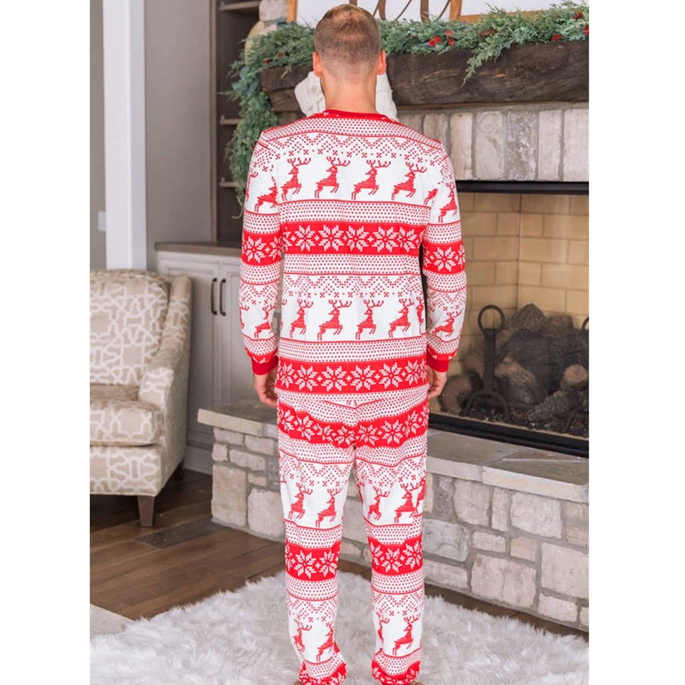 Family wearing matching red and white reindeer and snowflake print Christmas pajamas - view 6