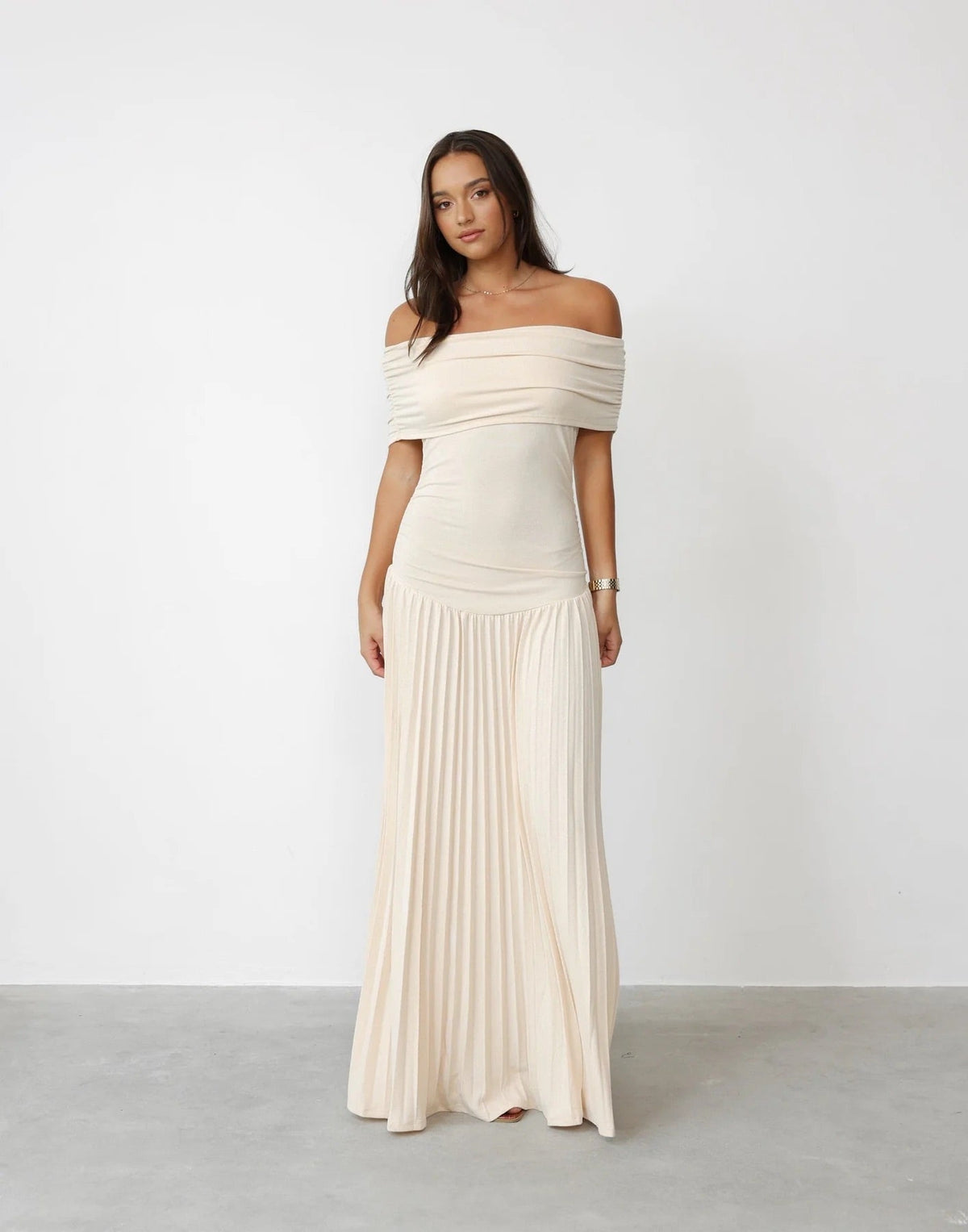 Cream off shoulder pleated maxi dress with ruched foldover neckline and drop waist
