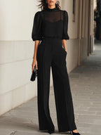 Black sheer mock neck blouse and pleated wide leg work pants set