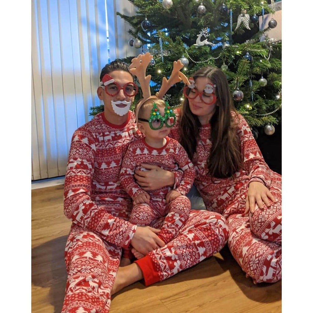 Red and white fair isle family Christmas pajamas with reindeer, tree and snowflake print - view 11