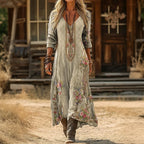 Woman wearing a floral V-neck long sleeve dress with vintage print and boots - view 2