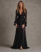Black lace long sleeve maxi dress with plunging V-neck and ruffled bell sleeves