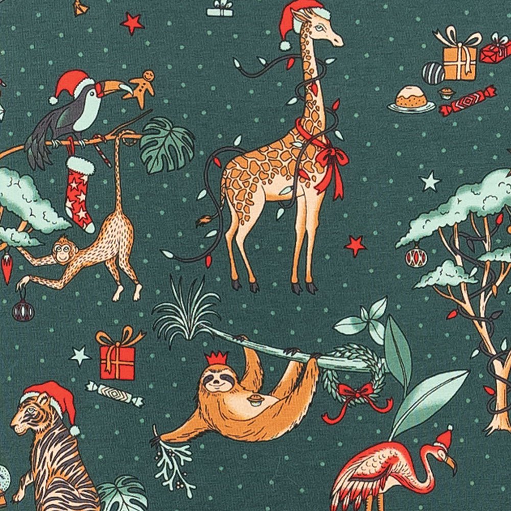 Family wearing matching green safari animal print Christmas pajamas - view 15