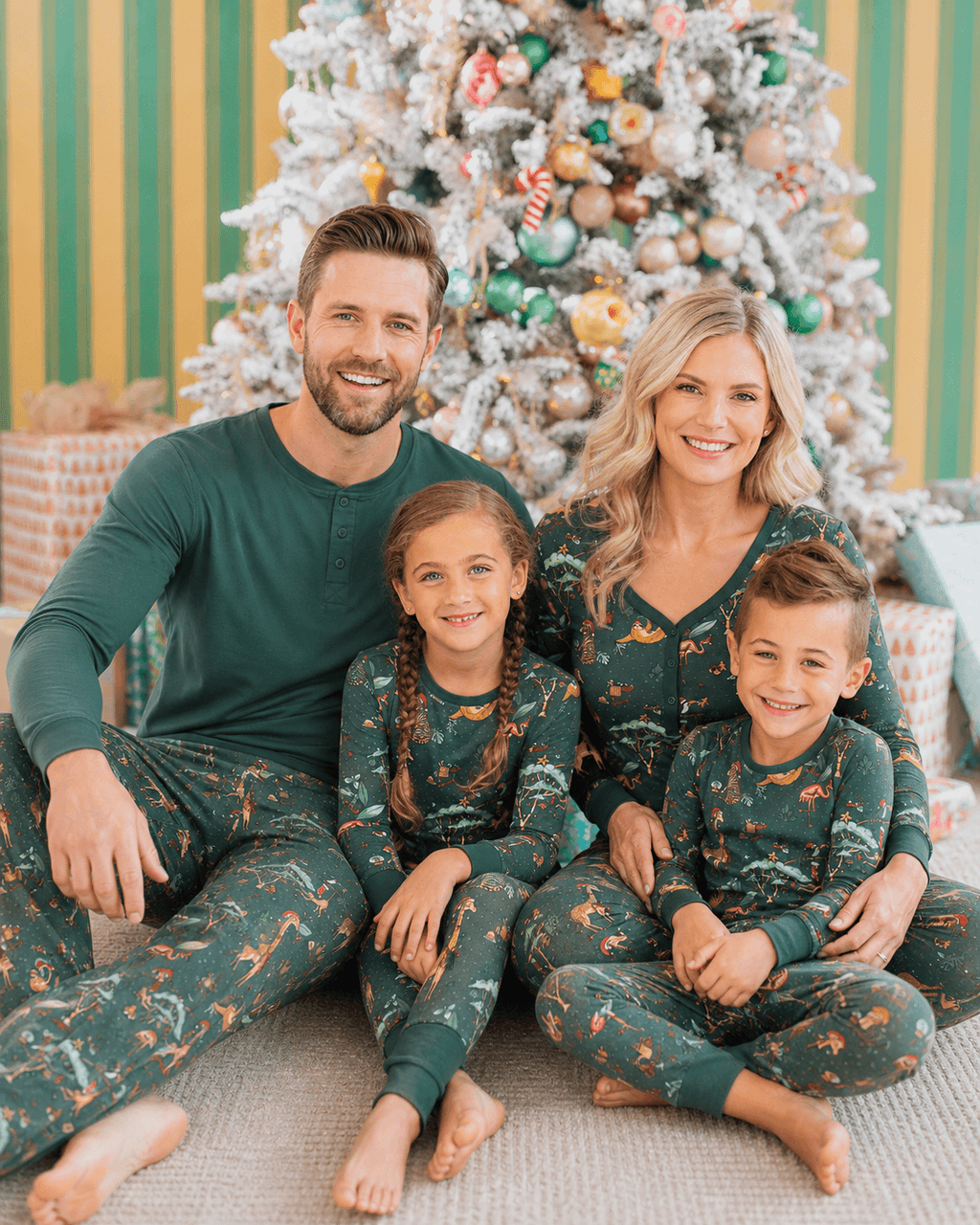 Family wearing matching green safari animal print Christmas pajamas - view 7