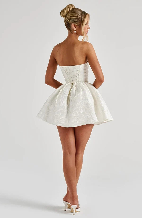 Pink floral jacquard strapless mini dress with oversized back bow and lace-up back - view 12