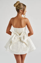 Pink floral jacquard strapless mini dress with oversized back bow and lace-up back - view 9