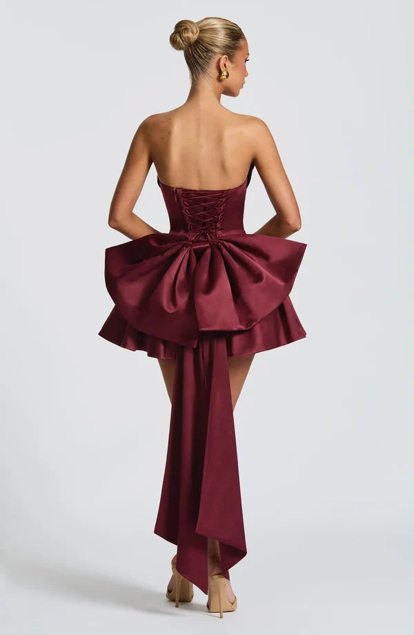 Light pink strapless satin mini dress with draped neckline, flared skirt and oversized back bow - view 10