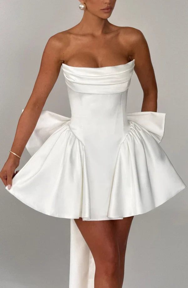 Light pink strapless satin mini dress with draped neckline, flared skirt and oversized back bow - view 27