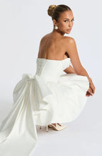 Light pink strapless satin mini dress with draped neckline, flared skirt and oversized back bow - view 33