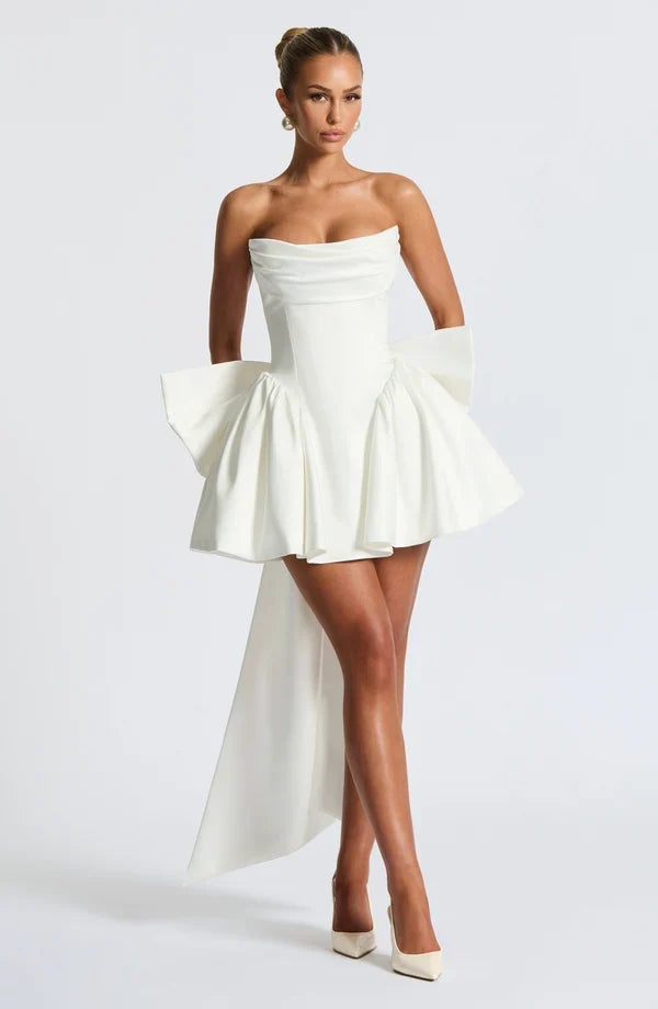 Light pink strapless satin mini dress with draped neckline, flared skirt and oversized back bow - view 34