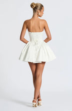 Light pink strapless satin mini dress with draped neckline, flared skirt and oversized back bow - view 36
