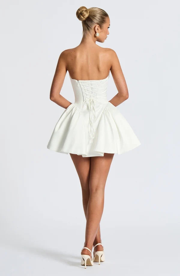 Light pink strapless satin mini dress with draped neckline, flared skirt and oversized back bow - view 36