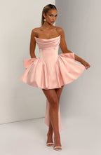 Light pink strapless satin mini dress with draped neckline, flared skirt and oversized back bow - view 6