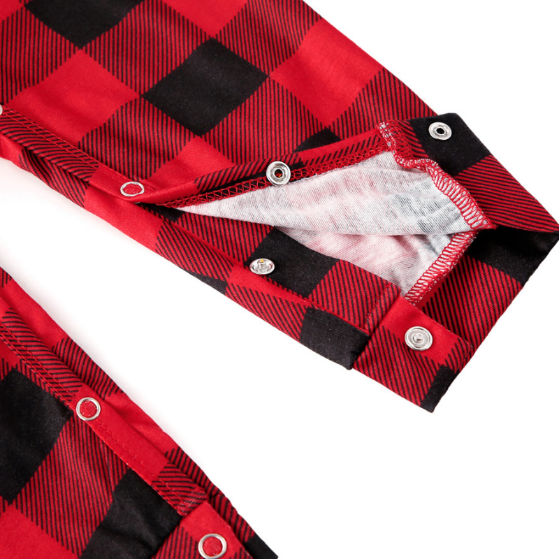 Family wearing matching red and black buffalo plaid Christmas pajamas - view 14