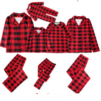 Family wearing matching red and black buffalo plaid Christmas pajamas - view 3