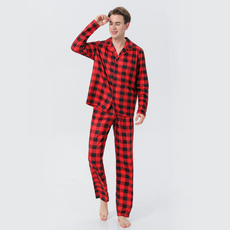 Family wearing matching red and black buffalo plaid Christmas pajamas - view 6