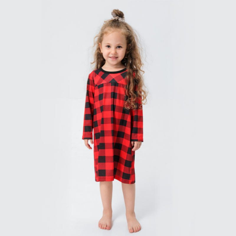 Family wearing matching red and black buffalo plaid Christmas pajamas - view 8