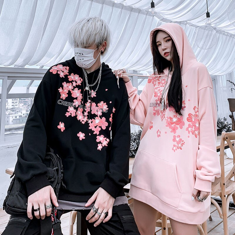 Oversized unisex hoodie with pink cherry blossom sakura print on front and back