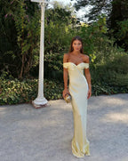 Woman wearing an off shoulder satin maxi wedding guest dress - view 2