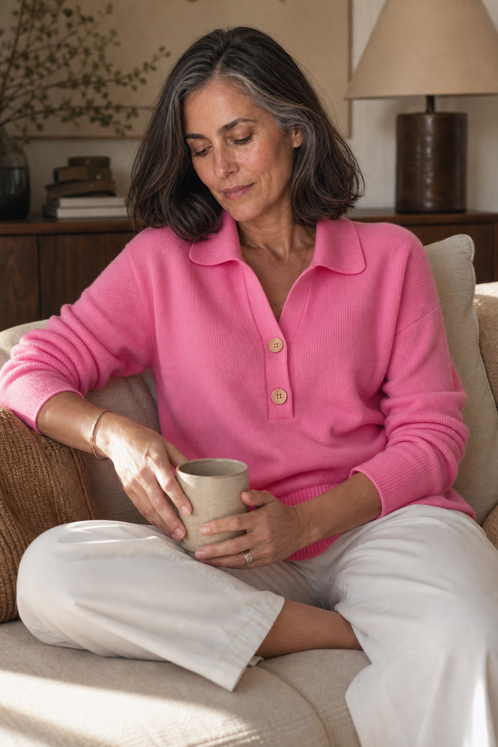 Woman wearing a relaxed collared knit sweater with a two-button placket - view 6
