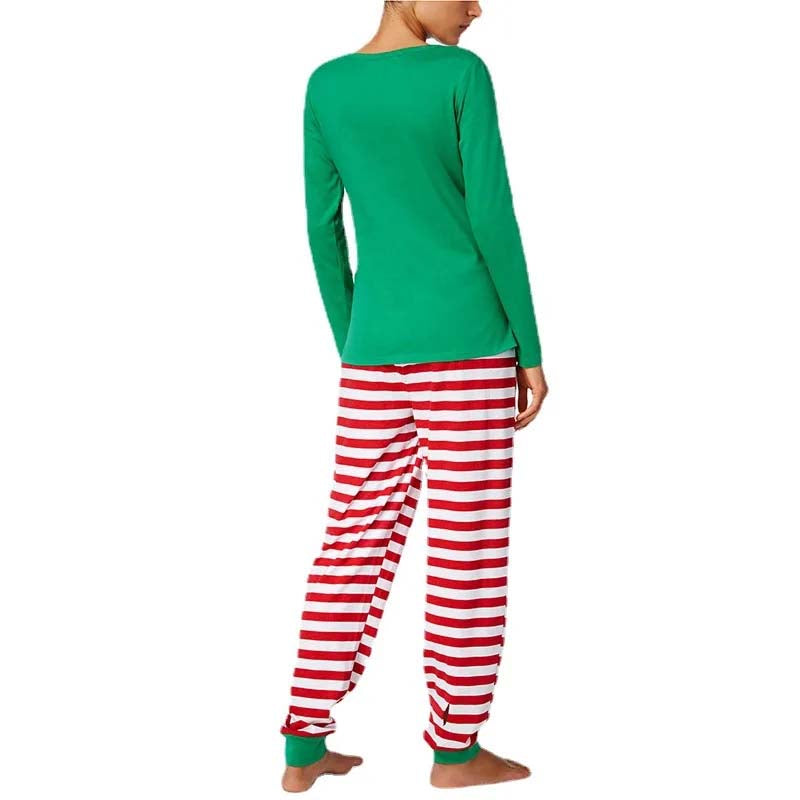 Family in matching green elf graphic tops and red and white striped Christmas pajama pants - view 8