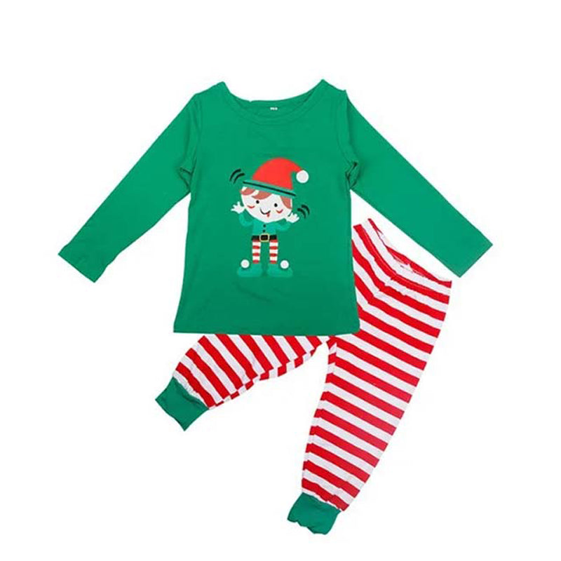 Family in matching green elf graphic tops and red and white striped Christmas pajama pants - view 9